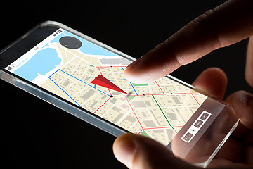 Image showing close up of hand with gps map on smartphone