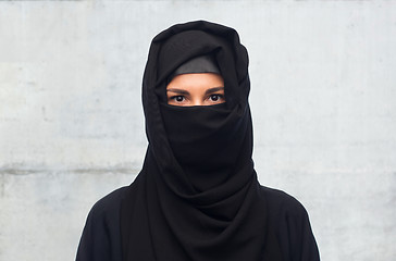 Image showing muslim woman in hijab over gray background