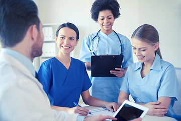 Image showing group of happy doctors meeting at hospital office