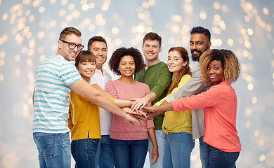 Image showing international group of happy people holding hands