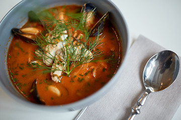 Image showing close up of seafood soup with fish and mussels