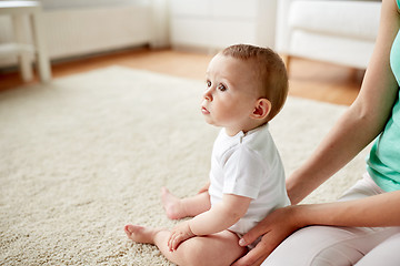 Image showing little baby with mother at home