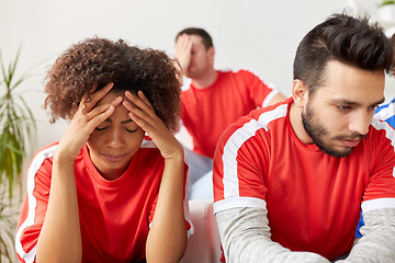 Image showing sad friends or football fans at home