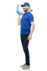 Image showing happy delivery man with bottle of water