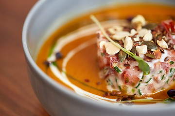 Image showing close up of vegetable pumpkin-ginger soup in bowl