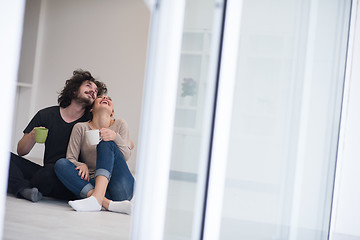 Image showing young couple in their new home