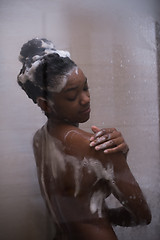 Image showing African American woman in the shower