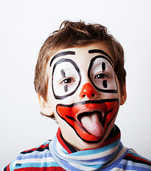 Image showing little cute boy with facepaint like clown, pantomimic expression