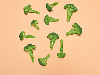 Image showing The fresh broccoli on pink background