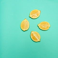 Image showing Lemons on green background