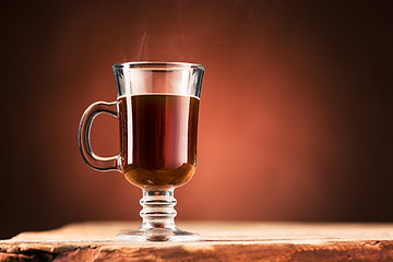 Image showing The black coffee in a glass