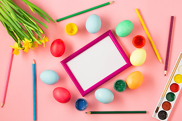 Image showing The top view of easter on pink table office workplace