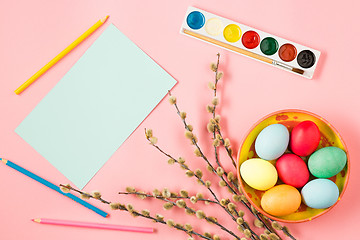 Image showing The top view of easter on pink table office workplace