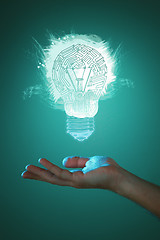 Image showing Hands of business person holding illuminated light bulb sign