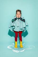 Image showing Little girl posing in fashion style wearing autumn clothing.