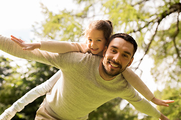 Image showing happy family having fun in summer park