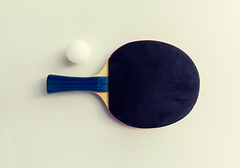 Image showing close up of table tennis rackets with ball