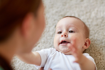 Image showing close up of happy little baby and mother