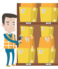 Image showing Warehouse worker scanning barcode on box.