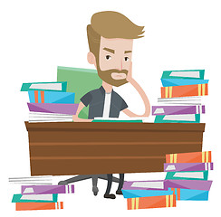 Image showing Student sitting at the table with piles of books.