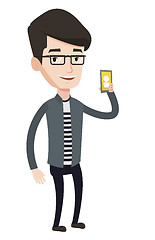 Image showing Man holding ringing mobile phone.