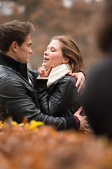 Image showing Autumn portrait of attractive happy couple