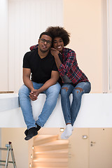 Image showing couple having break during moving to new house