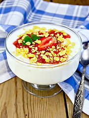 Image showing Dessert milk with strawberry and flakes in bowl on board