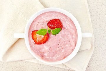 Image showing Soup strawberry in white bowl on granite table top