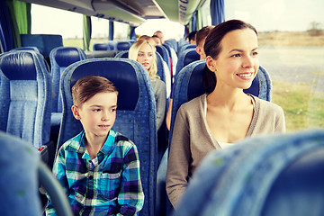 Image showing happy family riding in travel bus