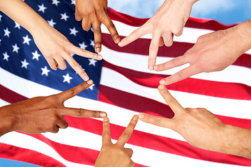 Image showing group of international people showing peace sign