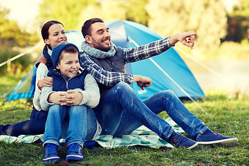 Image showing happy family with tent at camp site