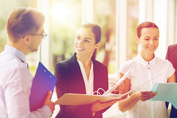 Image showing business team with folders meeting at office