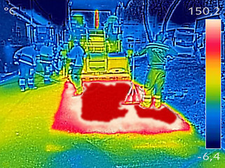 Image showing Infrared thermovision image Workers on Asphalting Road street