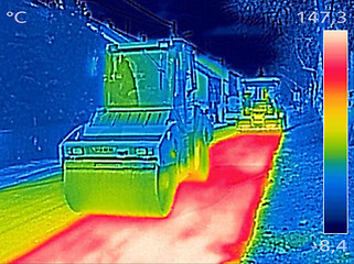 Image showing Infrared thermovision image Workers on Asphalting Road street 