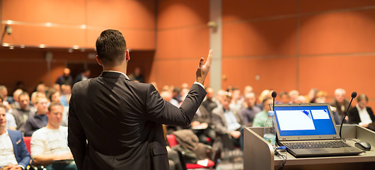 Image showing Public speaker giving talk at business event.