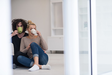 Image showing young couple in their new home