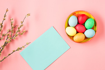 Image showing The top view of easter on pink table office workplace