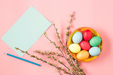 Image showing The top view of easter on pink table office workplace