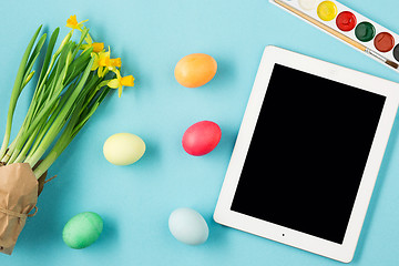 Image showing The top view of easter on blue table office workplace