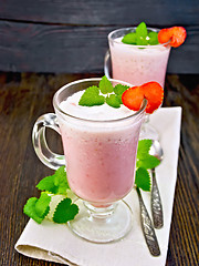 Image showing Soup strawberry in goblet with spoon on board