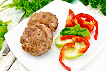 Image showing Cutlets stuffed with basil on board