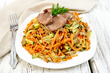 Image showing Salad of tongue and carrots on board