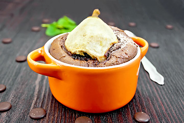 Image showing Cake with chocolate and pear in bowl on board