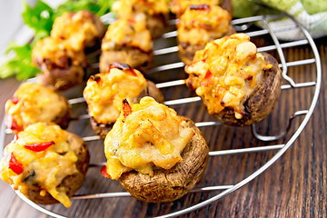 Image showing Champignons stuffed meat on lattice with parsley