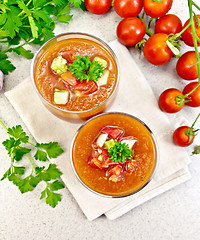 Image showing Soup tomato in two glasses on granite table top