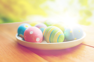 Image showing close up of colored easter eggs on plate