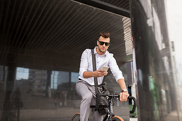 Image showing man with bicycle and smartphone on city street