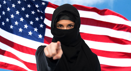 Image showing muslim woman in hijab pointing finger to you