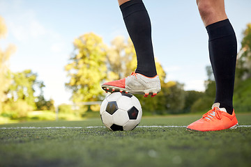 Image showing soccer player playing with ball on football field